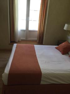 Postel nebo postele na pokoji v ubytování Hotel Cordón