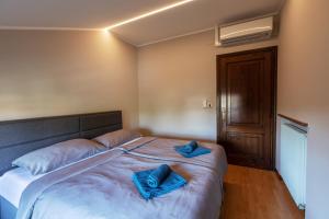 Postel nebo postele na pokoji v ubytování Doppelhaus Villa Casa Alpe Adria