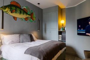 Postel nebo postele na pokoji v ubytování Bello!Lake Como Suites