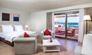 Кровать или кровати в номере Yacht Club