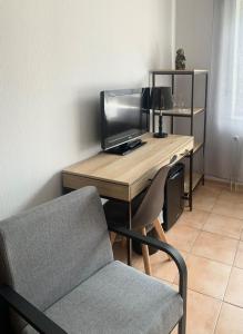 TV a/nebo společenská místnost v ubytování Hotel Borchers + 36 fotografií