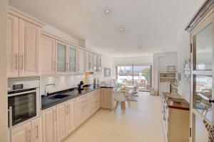 Kuchyň nebo kuchyňský kout v ubytování Elita House