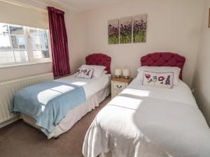 Katil atau katil-katil dalam bilik di Thistleyhaugh Cottage