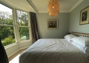 Posteľ alebo postele v izbe v ubytovaní Riverside Idyll - the perfect Cornish Sanctuary