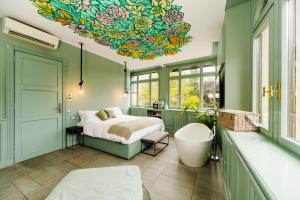 Postel nebo postele na pokoji v ubytování Bello!Lake Como Suites