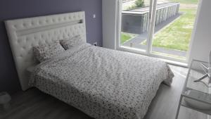 Postel nebo postele na pokoji v ubytování Tin Tin in Cadzand, Koolse Hoeve 1b