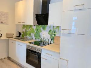 Una cocina o kitchenette en Apartment EIRA am Schleswiger Dom