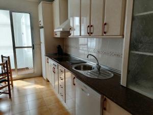 Kuchyň nebo kuchyňský kout v ubytování Apartamento Cayetano