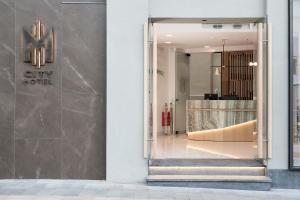 Koupelna v ubytování M City Hotel