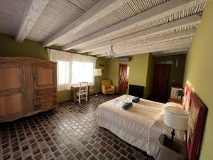 En eller flere senge i et værelse på Finca Albarossa + 31 billeder