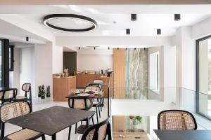 Kuchyň nebo kuchyňský kout v ubytování M City Hotel