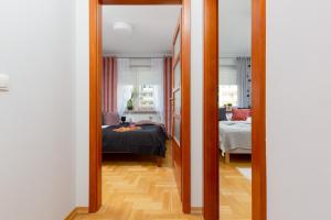 Posteľ alebo postele v izbe v ubytovaní Mokotów Apartment Bluszczańska by Noclegi Renters