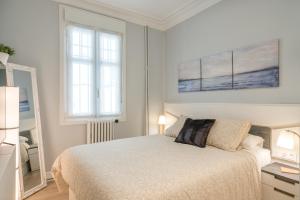 Postel nebo postele na pokoji v ubytování L' ATELIER DEL ARRIAGa