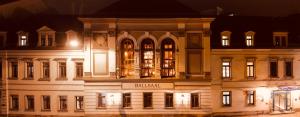 a model of a building at night at DORMERO Hotel Dresden City in Dresden