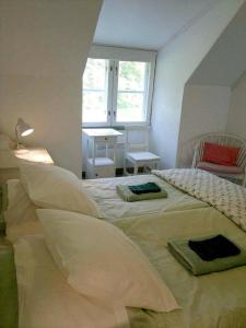 Ένα ή περισσότερα κρεβάτια σε δωμάτιο στο Hiekkaranta Bed & Breakfast