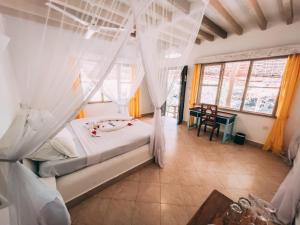 Letto o letti in una camera di Temple Point Resort