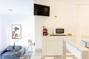Kuchyňa alebo kuchynka v ubytovaní Atarazanas FreshApartments