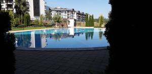 The swimming pool at or close to studio by the Pool in Aspen Heights Bansko