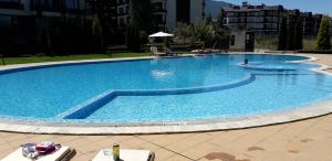 The swimming pool at or close to studio by the Pool in Aspen Heights Bansko