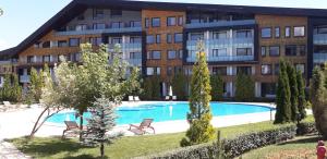 The swimming pool at or close to studio by the Pool in Aspen Heights Bansko