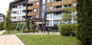 A garden outside studio by the Pool in Aspen Heights Bansko
