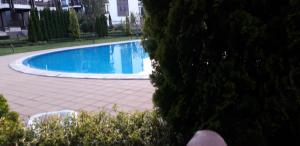 The swimming pool at or close to studio by the Pool in Aspen Heights Bansko