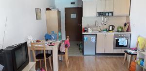 A kitchen or kitchenette at studio by the Pool in Aspen Heights Bansko
