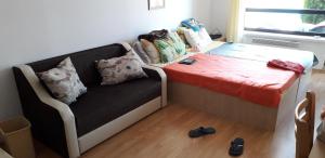 A bed or beds in a room at studio by the Pool in Aspen Heights Bansko