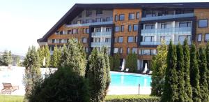 The swimming pool at or close to studio by the Pool in Aspen Heights Bansko
