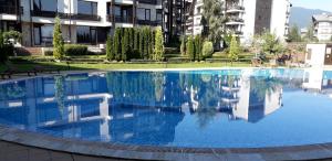 The swimming pool at or close to studio by the Pool in Aspen Heights Bansko