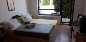 A bed or beds in a room at studio by the Pool in Aspen Heights Bansko