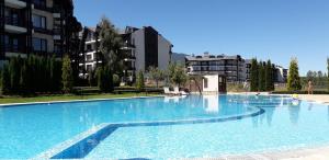 The swimming pool at or close to studio by the Pool in Aspen Heights Bansko