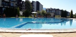 The swimming pool at or close to studio by the Pool in Aspen Heights Bansko