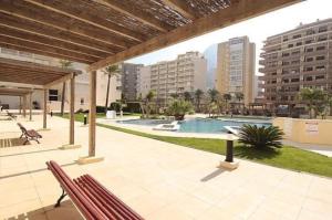Bazén v ubytovaní Apartamentos APOLO16 (I-15º-70) alebo v jeho blízkosti