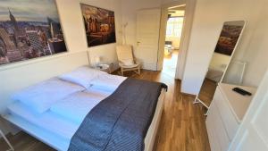 Postel nebo postele na pokoji v ubytování Apartment Blochmann-Cárre + 6 fotografií