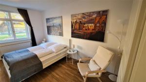 Postel nebo postele na pokoji v ubytování Apartment Blochmann-Cárre