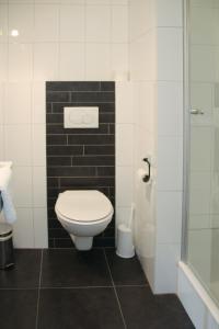 Ванная комната в Vakantiehuis B&B Familie Versantvoort