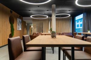Posezení v ubytování ALPSTADT LIFESTYLE Hotel