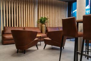 Posezení v ubytování ALPSTADT LIFESTYLE Hotel
