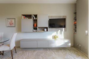 Łóżko lub łóżka w pokoju w obiekcie Contempora Apartments - Elvezia 8 - E51