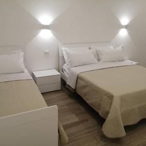 Postel nebo postele na pokoji v ubytování AMARE Bed & Breakfast