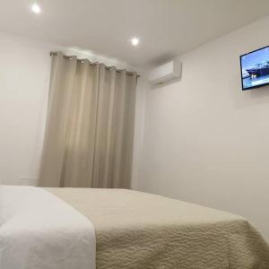 Letto o letti in una camera di AMARE Bed & Breakfast