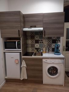 Kuchyň nebo kuchyňský kout v ubytování Insolite duplex + 4 fotografie