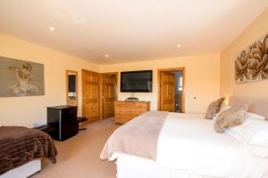 Tigh an Each B&B & Laggan Glamping客房内的一张或多张床位