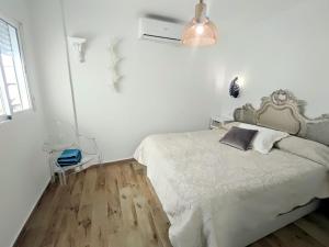 Posteľ alebo postele v izbe v ubytovaní La Terraza de Salomon ApartamentosMalagaManagement