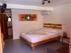 Кровать или кровати в номере Beach Front Bahia
