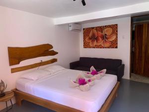 Кровать или кровати в номере Beach Front Bahia