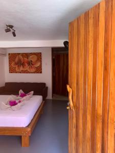 Кровать или кровати в номере Beach Front Bahia