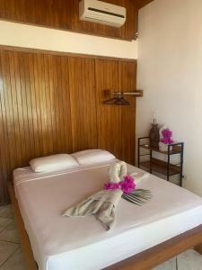 Кровать или кровати в номере Beach Front Bahia