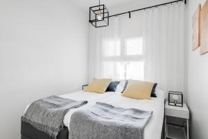 Кровать или кровати в номере Villa Kartano